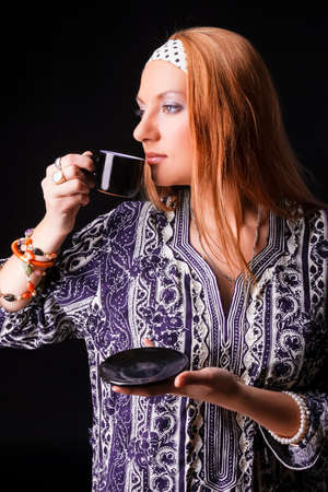 Portrait of Positive Caucasian Blond Girl With Cup of Coffee. Vertical image Compositionの写真素材