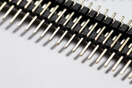Macro Shot of Long Straight PCB Connectors or Terminal Blocks Placed Bulk On White Background.の写真素材