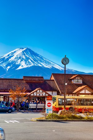 Fujiyama, Japan â November 12, 2019: Fujiyama Bus Station At Lake Kawaguchiko With Fuji Mount in Background in Japan at November 12, 2019のeditorial素材