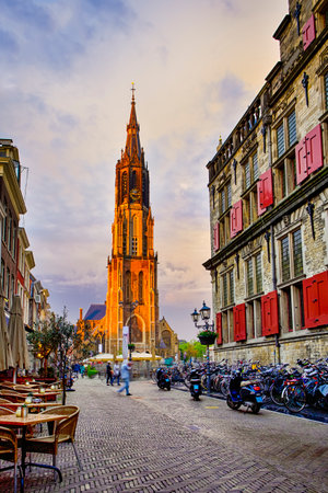 Dutch Travel Concepts. Protestant New Gothic Church (Nieuwe Kirche) on Markt Square in Dutch Old City Delft in Holland, the Netherlands. Vertical Shotのeditorial素材