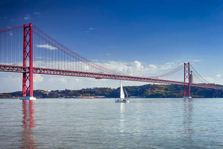 Portugal Travel Ideas. One Sailing Boat With Group of Tourist on Tagus River Under 25th of April...