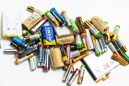 Minsk, Belarus - February 24, 2022: Variety Batch of Different Empty Used Discharged Batteries of...