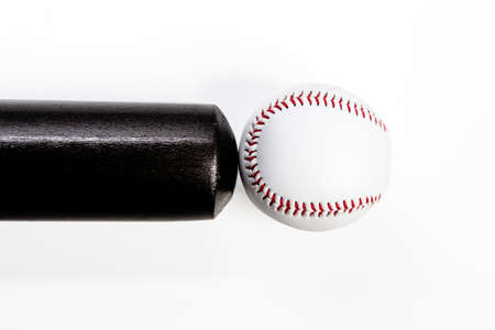 Closeup Image of Laquered Wooden Brown American Baseball Bat Along With Clean Leather Ball Placed Together Over White Background.Horizontal Imageの写真素材