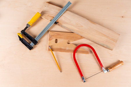 Carpentry Concepts and Ideas. Lineup of Assorted work tools on wood.Horizontal imageの写真素材