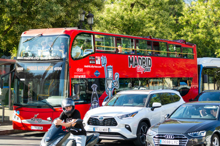 Madrid, Spain - July 25, 2023: Touristic Bus in Madrid as Touristic Sightseeing Service with Audio guide in Madrid, Spain, July 25, 2023のeditorial素材