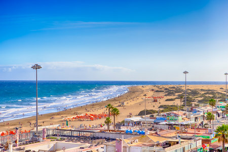 Maspalomas, Spain - November 19, 2022: Beach With Restaurants and Stores At Maspalomas of Grand Canariaのeditorial素材