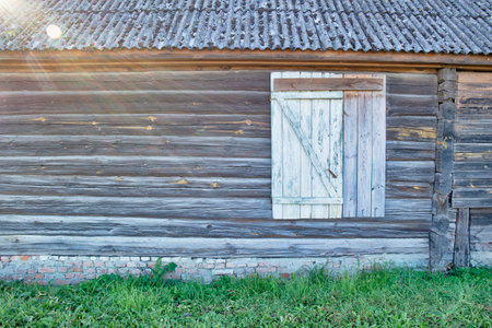 Travel Ideas. Old Wooden Door and Window In Countryside Area Over Old Brick Base. Horizontal imageの写真素材