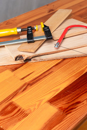 Separate Lineup of Assorted work tools on wooden Background. Vertical image Compositionの写真素材