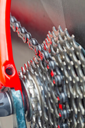 Clousep of Rear Derailier and Rear Cassette with Dirty Oiled Chain and Cassette Sprockets Outdoors....