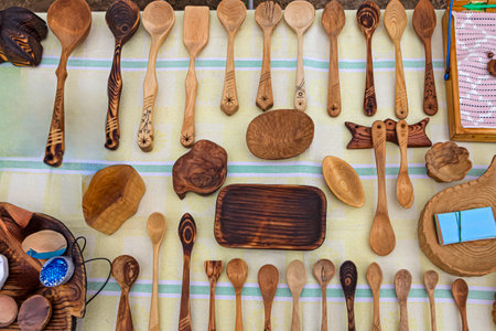 Flat Lay Display Set of Different Empty Kitchen Spoons Made of Various Kinds of Wood. Horizontal Imageの写真素材