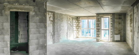 Architecture Concepts. Interior View of Newly Built Apartment With No Decoration in Bright White Colors With Rough Finish. Horizontal Imageの写真素材