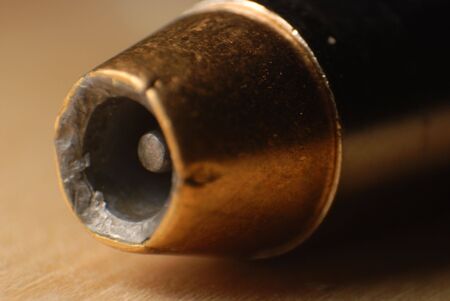 Closeup of the front of a hollow point bullet