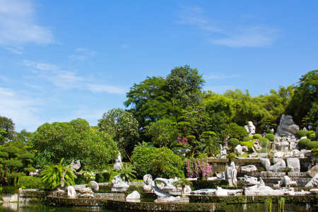 Tropical garden. Park of  million old years stones in Thailand.の写真素材