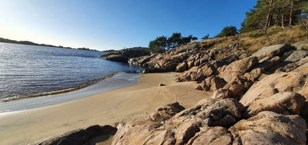 Sunny winters day at the southern most coast of Mandal, Norwayの写真素材