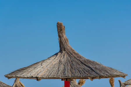 Beach umbrellas made of reeds