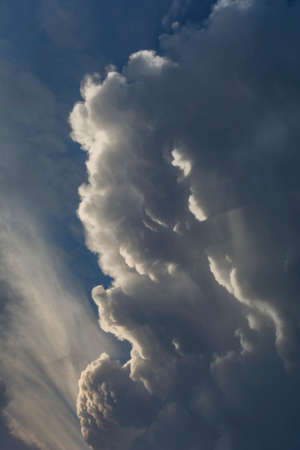 Angry clouds shape.Furious man face. Dramatic cloudscape area background.