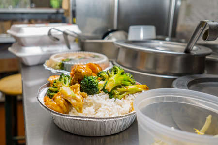 take out orders on the kitchen tableの写真素材