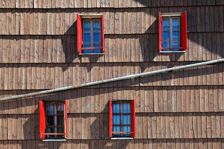 Old windows on a cottageの写真素材