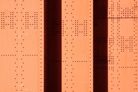 Golden Gate Bridge - shadows and lights on a surface of a pillar, San Francisco (USA)