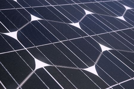 Photovoltaic cells in a solar panel - perspective viewの写真素材