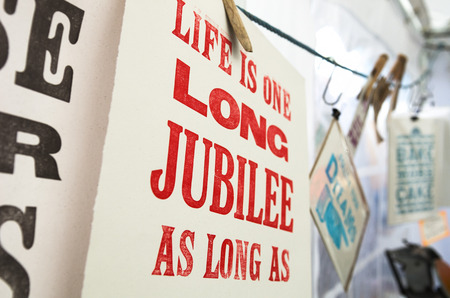 vintage wise quotes screen printed and hanging out to dryの写真素材