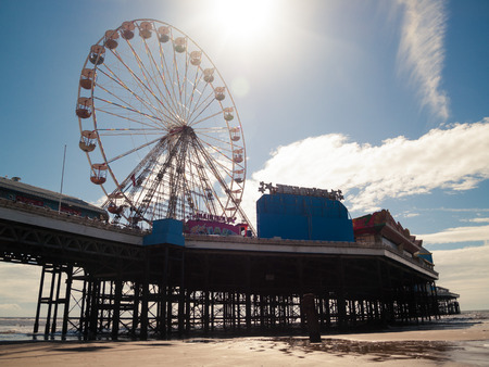 England, Blackpool, 04/22/2015, Blackpool south piers big wheel with sun flare vintage feel.のeditorial素材