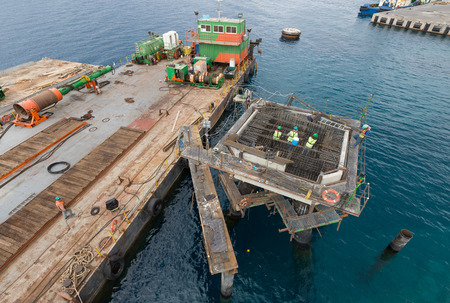 Aqaba, Jordan, 10/10/2015, Metal and concrete foundation construction at the Aqaba new port photographed from aboveのeditorial素材