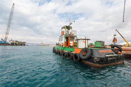 Aqaba, Jordan, 10/10/2015, Tugboat transporter at the Aqaba new port