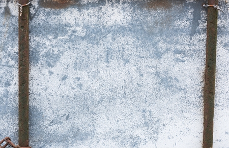 A well used rustic metal weathered metal sheet texture.
