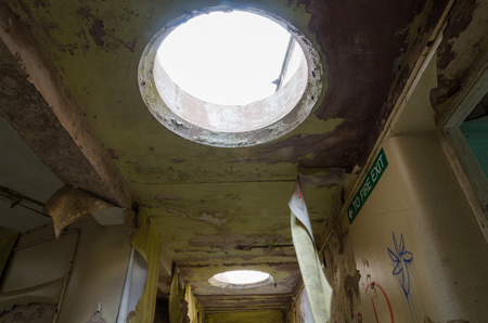 lancashire, England, 04/04/2014, Whittingham Mental Asylum, An old abandoned corridor with peeling paint , in an abandoned building. Exploring urban decay.のeditorial素材