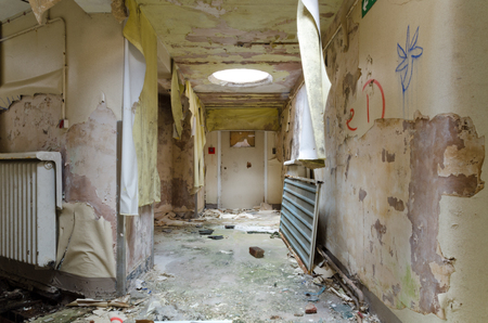 lancashire, England, 04/04/2014, Whittingham Mental Asylum, An old abandoned corridor with peeling paint , in an abandoned building. Exploring urban decay.のeditorial素材