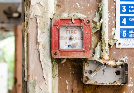 lancashire, England, 04/04/2014, Whittingham Mental Asylum, An old abandoned smashed fire alarm button in an abandoned building. Exploring urban decay.のeditorial素材