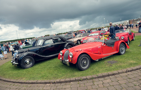 England, Morecambe, 08/16/2016, austin marten car at the Vintage by the sea weekend at the Midland Hotel in england, Retro vintage cars outside the midland hotel.のeditorial素材
