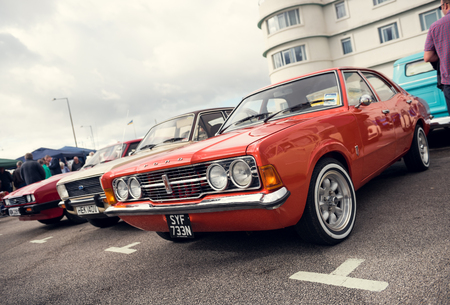 England, Morecambe, 08/16/2016, Old retro ford escort car, at the Vintage by the sea weekend at the Midland Hotel in england, Retro vintage cars outside the midland hotel.のeditorial素材