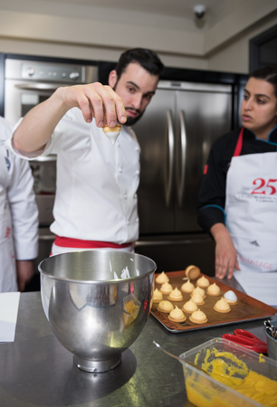 dubai, united arab emirates, 02/02/2016, Top chef cooking and catering class. Educating junior chefs how to cook, from the expertise of senior chefs working in the industry. Catering class education.のeditorial素材