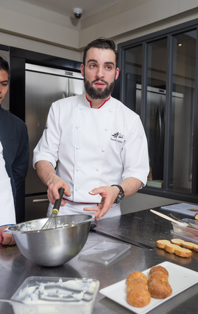 dubai, united arab emirates, 02/02/2016, Top chef cooking and catering class. Educating junior chefs how to cook, from the expertise of senior chefs working in the industry. Catering class education.のeditorial素材