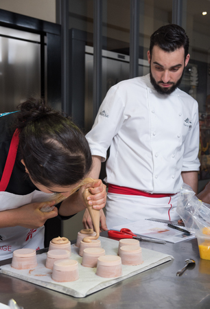 dubai, united arab emirates, 02/02/2016, Top chef cooking and catering class. Educating junior chefs how to cook, from the expertise of senior chefs working in the industry. Catering class education.のeditorial素材