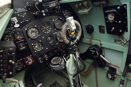 morecambe, england, 02/05/2016, The cockpit and controls inside a world war two spitfire british war plane. Thruster, fuel dials and direction control.のeditorial素材