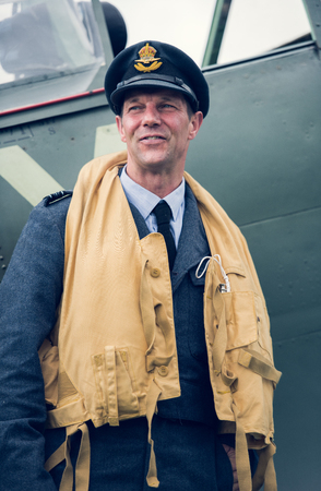 morecambe, england, 02/05/2016, A world war two spitfire plane pilot, standing next to a spitfire plane.のeditorial素材