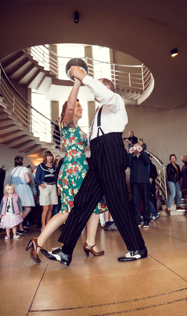 morecambe, england, 05/05/2017, A man and woman dancing to 1940s retro vintage world war two swing music,  at the vintage weekend in morecambe midland hotel.のeditorial素材