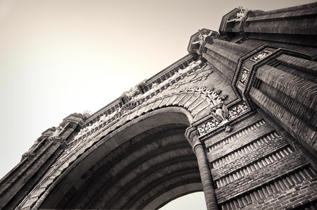 A wide angle black and white shot  of The Arc de Triomf or Arco de Triunfo in Spain, is a triumphal arch in the city of Barcelona in Catalonia, Spain.の写真素材