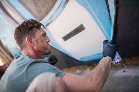 ulverston, England, 05/05/201, A graffiti artist working at a public exhibition of legal graffiti...