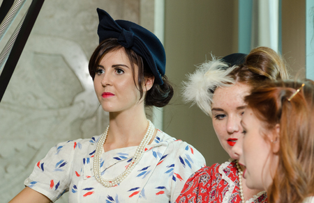 london, England, 05/05/2017, A stylish retro vintage fashionable group of young girls, in a Best dressed award at a vintage event..のeditorial素材