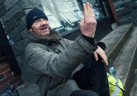 Lancashire, England, 05/05/2017, Wayne Dixon and Koda the Northern Inuit Dog are walking around UK cleaning up Street litter on the streets. Wayne is raising money for the mental health charity MIND.のeditorial素材