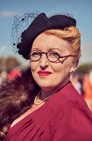 morecambe, England, 05/05/2017, A lady wearing stylish retro vintage fashionable 1940s clothing, posing in fancy dress cosplay in a Best dressed award at a vintage event at the Midland hotel.のeditorial素材