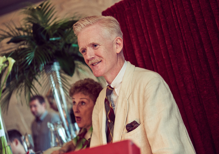 morecambe, england, 05/05/2017, A retro vintage senior man dj disc jockey, with a white suit and moustache, at a vintage dancing event at the midland hotel in morecambe. Vintage retro color setting.のeditorial素材