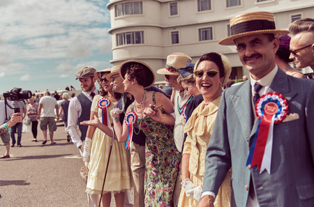 morecambe, England, 05/05/2017, A group of stylish retro vintage fashionable men and women acting and posing in fancy dress cosplay in a Best dressed award at a vintage event at the Midland hotel.のeditorial素材