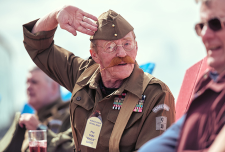 london, England, 05/05/2017, A stylish retro vintage fashionable man dressed in war time world war 2...