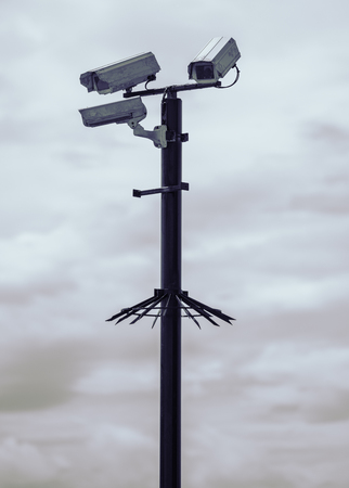 Rustic urban city surveillance cctv video monitoring cameras, spying on civilians. big brother is watching you.の写真素材