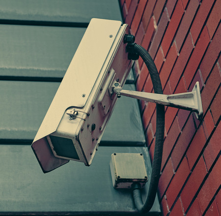 Rustic urban city surveillance cctv video monitoring cameras, spying on civilians. big brother is...